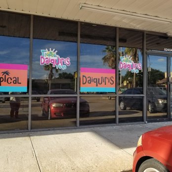 Tropical Daiquiris - a red car parked in front of a store - Juice Bars & Smoothies Near Me - Houston, Texas Tropical Daiquiris - a red car parked in front of a store - Juice Bars & Smoothies Near Me - Houston, Texas