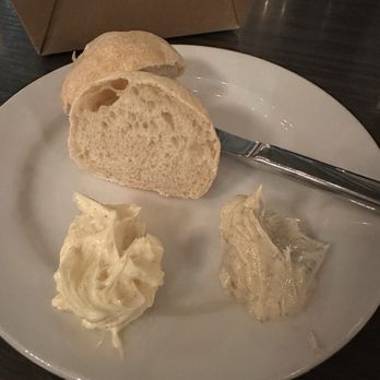 Mezzaluna - Weird pasty bread, butter was okay - New American Near Me - Fargo, North Dakota