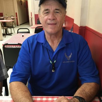 MC Wine bar - a man sitting at a table with a cup of coffee - Wine Bars Near Me - Inverness, Florida MC Wine bar - a man sitting at a table with a cup of coffee - Wine Bars Near Me - Inverness, Florida