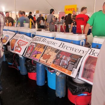 Chuck's Fest - people standing around a table full of beer - Food Near Me - Bridgeview, Illinois Chuck's Fest - people standing around a table full of beer - Food Near Me - Bridgeview, Illinois