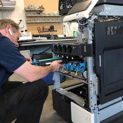 Sunrise Office Systems - Gutting the copier before cleaning