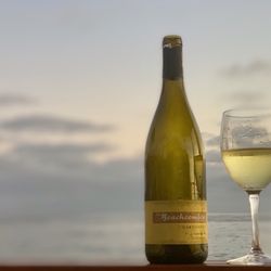 The Beachcomber Cafe - A glass of Beachcomer Chardonnay at sunset 
Photo by Kathi