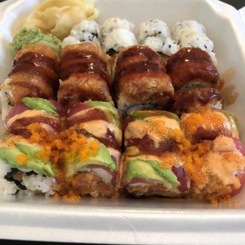 Sushi UNI - Top: Spicy Crunchy Salmon Roll Middle: Spicy Girl Roll Bottom: Ahi Tuna Roll - Sushi Bars Near Me - Lenexa, Kansas Sushi UNI - Top: Spicy Crunchy Salmon Roll Middle: Spicy Girl Roll Bottom: Ahi Tuna Roll - Sushi Bars Near Me - Lenexa, Kansas
