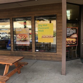 Subway - a bench and a table outside of a restaurant - Sandwiches Near Me - Coarsegold, California
