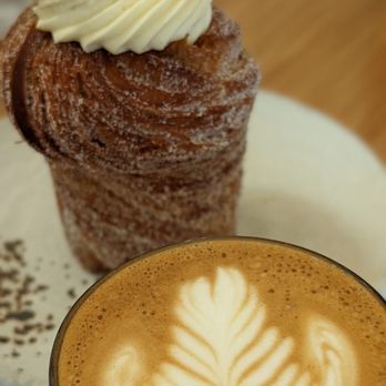 Nemesis Coffee - Latte and orange chamomile Honey cruffin - Coffee & Tea Near Me - Vancouver, British Columbia Nemesis Coffee - Latte and orange chamomile Honey cruffin - Coffee & Tea Near Me - Vancouver, British Columbia