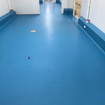 Concrete Finishers - a blue floor in a building - Flooring Near Me - Stone Park, Illinois Concrete Finishers - a blue floor in a building - Flooring Near Me - Stone Park, Illinois