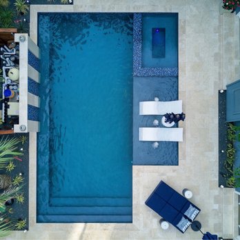 First Class Pools & Spas - Drone shot of pool area designed and built by First Class Pools & Spas. - Pool Cleaners Near Me - Sachse, Texas