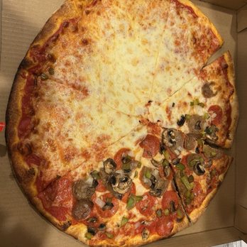 Carmine’s Pizza Kitchen - Carmines special half... that half was a bit lean on topping. - Pizza Near Me - Henderson, Nevada Carmine’s Pizza Kitchen - Carmines special half... that half was a bit lean on topping. - Pizza Near Me - Henderson, Nevada