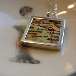 Iowa Artisans Gallery - Iowa City pendant by Kathy Lowenstern on a saucer by Iowa artist, Amanda Barr