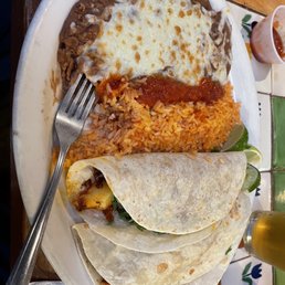 Al Pastor tacos with rice and beans Al Pastor tacos with rice and beans