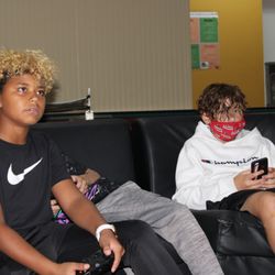 Troy Rec Association - Students playing video games in the gameroom.