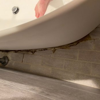 Kimpton Brice Hotel - Behind the tub, where we also found someone's toothbrush! Ew. - Hotels Near Me - Savannah, Georgia
