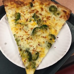 a slice of pizza on a paper plate