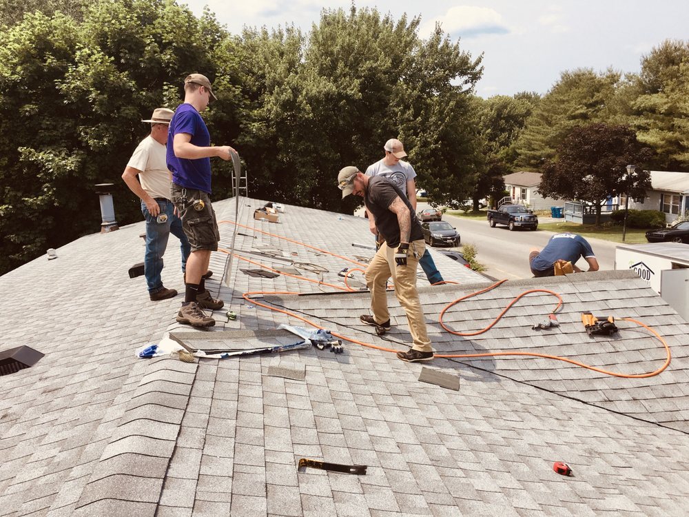 Slide of Ready Roofers