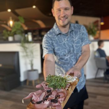 Taste Wine Cafe - Nick our server delivering this massive customizable Bruschetta board...for $16!! - Wine Bars Near Me - West Linn, Oregon Taste Wine Cafe - Nick our server delivering this massive customizable Bruschetta board...for $16!! - Wine Bars Near Me - West Linn, Oregon