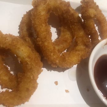 Kayamono - two onion rings on a plate with dipping sauce - Japanese Near Me - Woodbridge, Ontario Kayamono - two onion rings on a plate with dipping sauce - Japanese Near Me - Woodbridge, Ontario