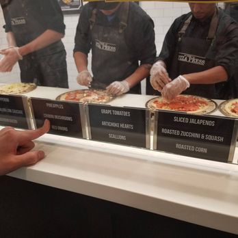 The Pizza Press - Various Toppings - Pizza Near Me - Austin, Texas