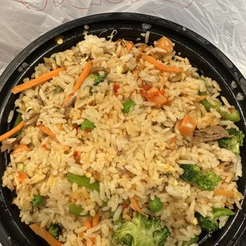 Wings 101 - a bowl of rice with broccoli and carrots - Chicken Wings Near Me - Smyrna, Georgia