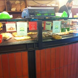 This is the counter with all the delicious pizza's This is the counter with all the delicious pizza's