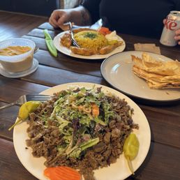 Chicken Kebob w/yellow rice, hummus w/bread and beef & lamb shawarma. Chicken Kebob w/yellow rice, hummus w/bread and beef & lamb shawarma.