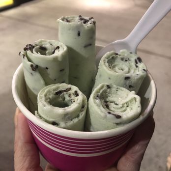 Rolled Ice Cream - Supposed to be Mint Chocolate Chip topped with Chocolate Sprinkles. Ended up with Mint with sprinkles poured in the ice cream milk. - Ice Cream & Frozen Yogurt Near Me - Orlando, Florida
