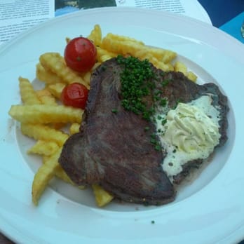 Löwenbräukeller - Ochsenlende Pommes Speckkrautsalat - German Near Me - Munich, BY Löwenbräukeller - Ochsenlende Pommes Speckkrautsalat - German Near Me - Munich, BY