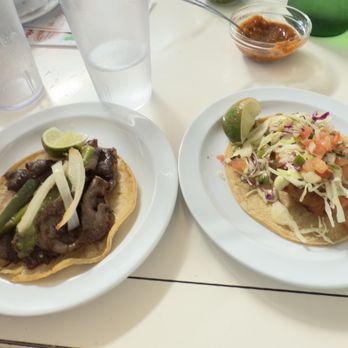 Tacombi - Left: Brisket Ribeye Deluxe Taco. Right: Baja Crispy Fish Taco. - Cocktail Bars Near Me - Bethesda, Maryland Tacombi - Left: Brisket Ribeye Deluxe Taco. Right: Baja Crispy Fish Taco. - Cocktail Bars Near Me - Bethesda, Maryland
