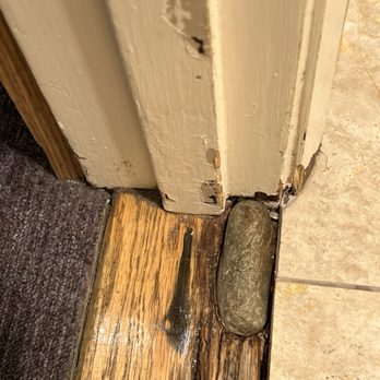 Cavalier Oceanfront Resort - Threshold strip bad and a rock used to fill in rotting hole - Resorts Near Me - San Simeon, California Cavalier Oceanfront Resort - Threshold strip bad and a rock used to fill in rotting hole - Resorts Near Me - San Simeon, California