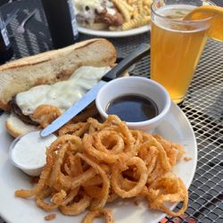 Barleys Bar - Prime rib melt with haystack onion rings
