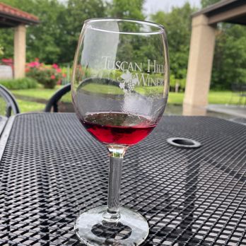 Tuscan Hills Winery - a glass of wine on a table - Wineries Near Me - Effingham, Illinois Tuscan Hills Winery - a glass of wine on a table - Wineries Near Me - Effingham, Illinois