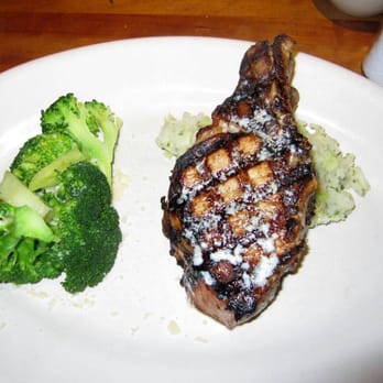 Houston's Restaurant - DOUBLE CUT ROTISSERIE PORK CHOP - New American Near Me - Irvine, California