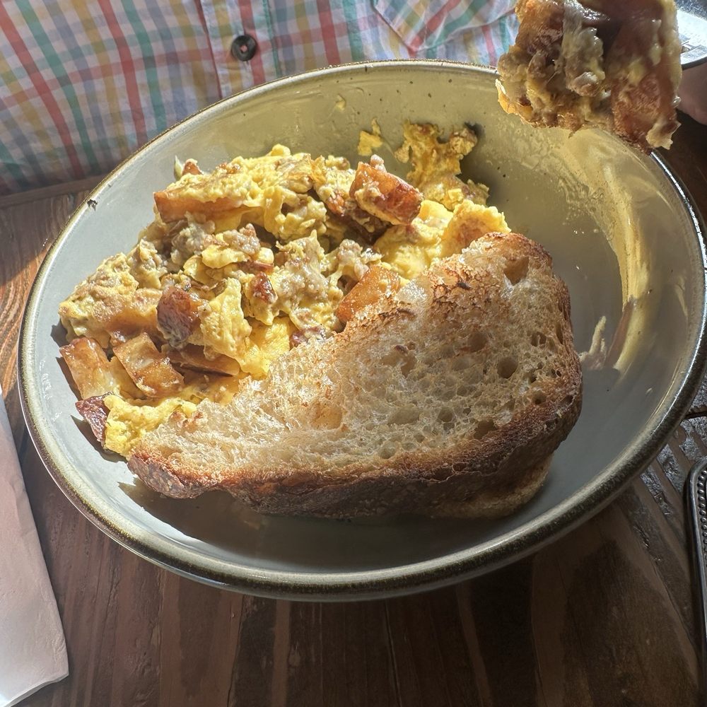 Scramble omelet with sausage, bacon and cheese...Delish