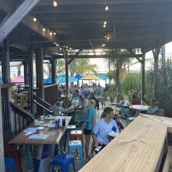 Macky's Bayside Bar & Grill - Indoor/outdoor bar area - Seafood Near Me - Ocean City, Maryland Macky's Bayside Bar & Grill - Indoor/outdoor bar area - Seafood Near Me - Ocean City, Maryland