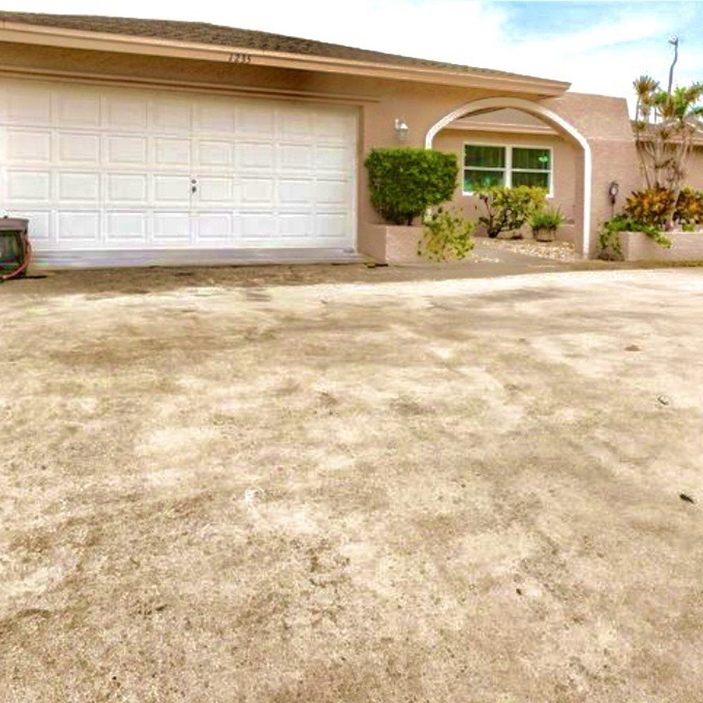 Extreme Exterior Cleaning - Driveway before - Pressure Washers Near Me