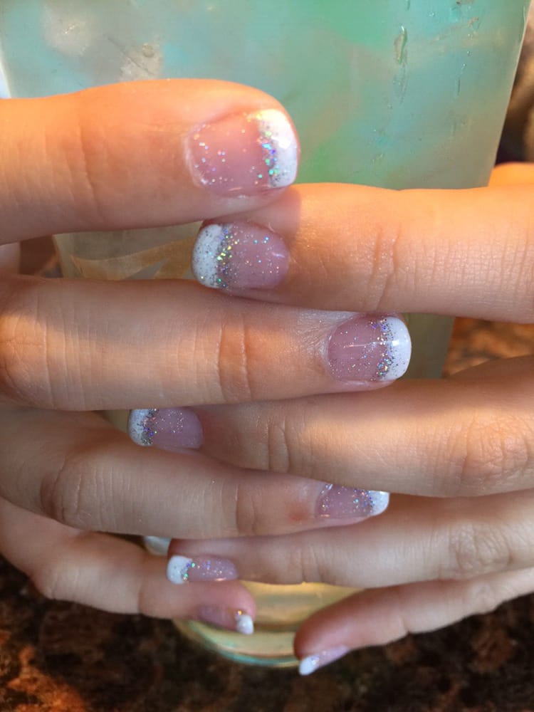 Hair & Nail Solutions Logo