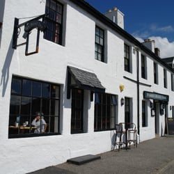 Ferry Boat Inn - The "pub side" is on the left - where you can see the woman behind the window.