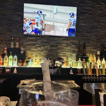 Wing Daddy's Sauce House - Bar top watching football. - Chicken Wings Near Me - Mission, Texas Wing Daddy's Sauce House - Bar top watching football. - Chicken Wings Near Me - Mission, Texas