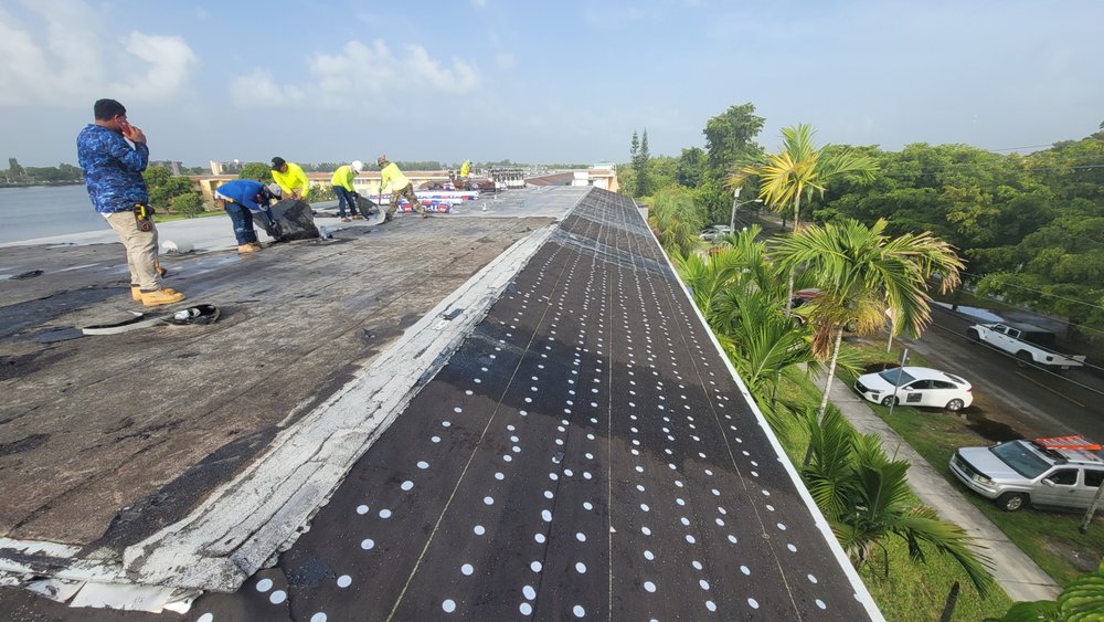 Slide of Big Al's Roofing