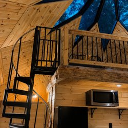 Whispering Winds Campground - Foxfire Zome glamping cabin flower petal skylight and loft.