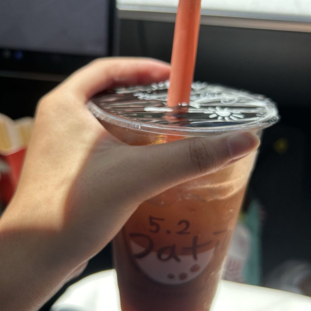 Mango Black Tea with mango popping boba