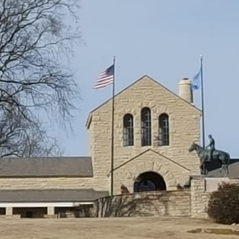 Will Rogers Memorial Museum - Will Rogers Museum. The burial crypt is behind the statue of Will on horseback - Museums Near Me - Claremore, Oklahoma