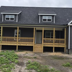 Batson's Gutter Systems - Black gutter and downspouts