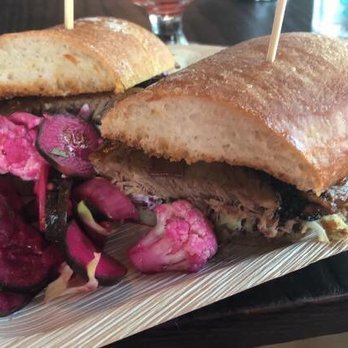 Perihelion Brewery - BBQ Brisket Sandwich with pickled vegetables. - Burgers Near Me - Seattle, Washington Perihelion Brewery - BBQ Brisket Sandwich with pickled vegetables. - Burgers Near Me - Seattle, Washington