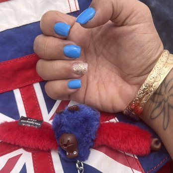 Star & Stripes Nails Spa - Blue nails with one gold glitter nail! - Nail Salons Near Me - Portland, Texas