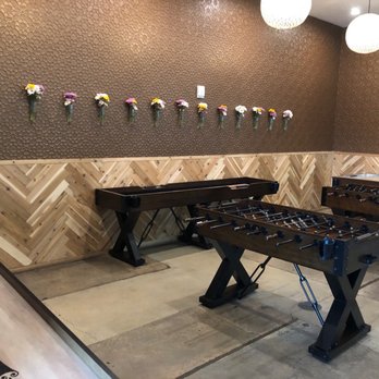 Proof Brewing Company - Indoor game area appears idle. Picked up later. - Breweries Near Me - Tallahassee, Florida Proof Brewing Company - Indoor game area appears idle. Picked up later. - Breweries Near Me - Tallahassee, Florida