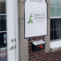 Schweiger Dermatology Group - Front door with sign