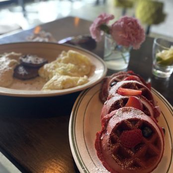 Taste Bar + Kitchen - Red Velvet Waffle, 2 eggs, chicken sausage and grits - Cocktail Bars Near Me - Houston, Texas Taste Bar + Kitchen - Red Velvet Waffle, 2 eggs, chicken sausage and grits - Cocktail Bars Near Me - Houston, Texas