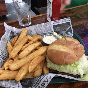 Freckled Fin Irish Pub - Blackened Mahi sandwich and fries. - Irish Pub Near Me - Holmes Beach, Florida