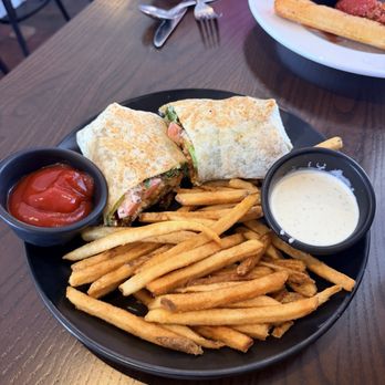 The Dalton Bar And Grill - Chicken Wrap with Fries - Sandwiches Near Me - King, North Carolina The Dalton Bar And Grill - Chicken Wrap with Fries - Sandwiches Near Me - King, North Carolina