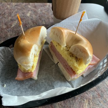Nezuntoz Cafe - Egg, ham and cheese on a toasted plain bagel. With a medium coffee. - Coffee & Tea Near Me - Binghamton, New York Nezuntoz Cafe - Egg, ham and cheese on a toasted plain bagel. With a medium coffee. - Coffee & Tea Near Me - Binghamton, New York